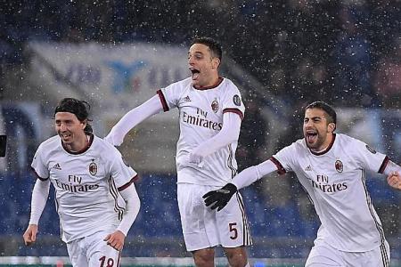Milan reach Italian Cup final after shoot-out win