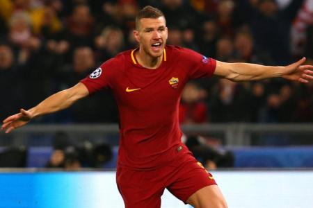 Dzeko scores to help Roma reach last eight