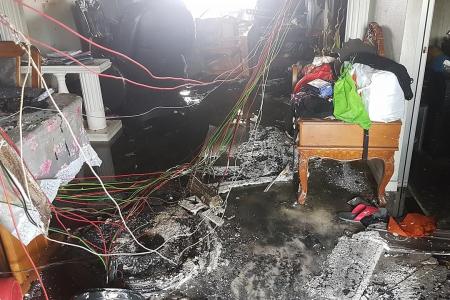 Neighbours help evacuate residents after fire breaks out at CCK flat