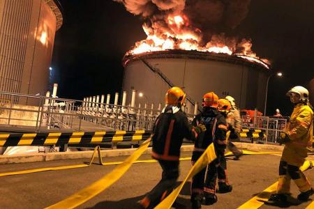 Six-hour fight to subdue oil storage tank blaze