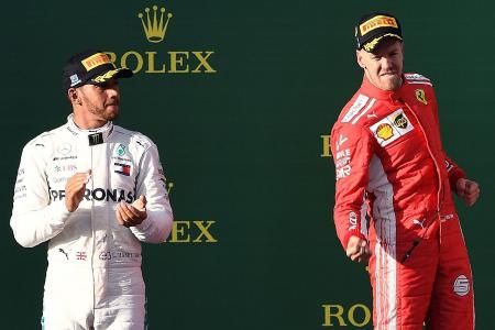 Vettel pips Hamilton for win
