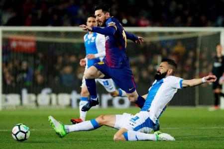 Three-goal Messi helps Barca equal La Liga record