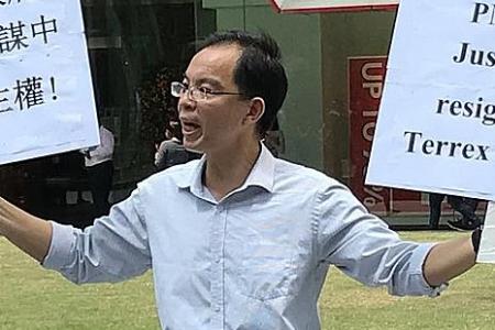 Raffles Place protester jailed and fined