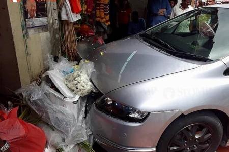Worker hurt after car crashes into Little India roadside stall