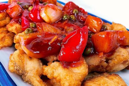 Fried fish with spicy sweet and sour sauce