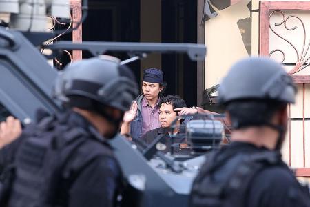Indonesia cops say prison riot over, killings described as sadistic 