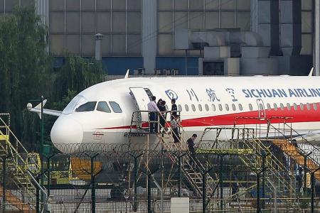 Sichuan Airlines co-pilot sucked halfway out of window, captain says 