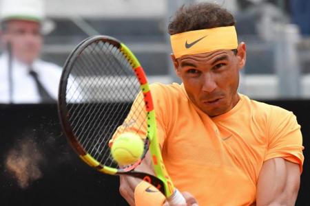 Nadal sets up semi-final date with Djokovic