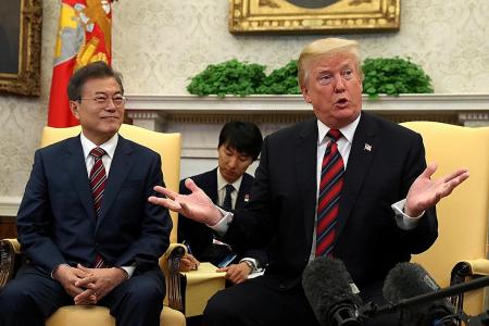 Trump says Singapore summit with Kim may not take place as planned