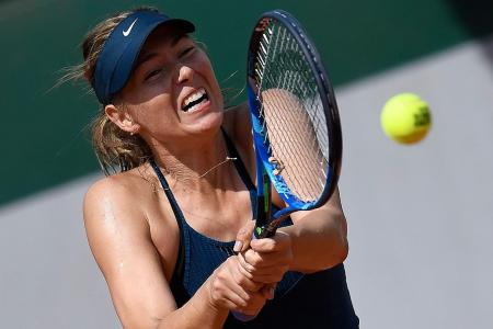 Sharapova grinds out a win
