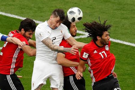 Uruguay break Egypt's hearts with late Gimenez goal