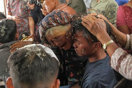 128 missing after overloaded ferry sinks in Lake Toba