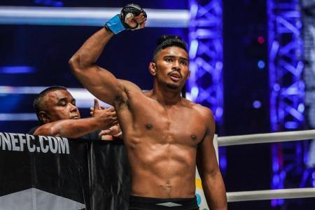 Singapore fighter Amir Khan defeats Philippines' Banario