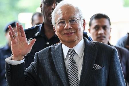Najib wants cops to return $39m, claims the money is Umno funds
