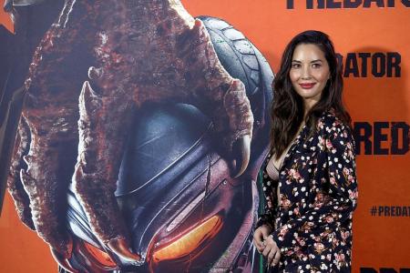 Olivia Munn toughens up, fights for her life in The Predator