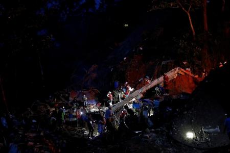 Desperate search for landslide survivors in Philippines continues