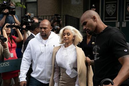 Cardi B charged with assault, endangerment over strip club brawl