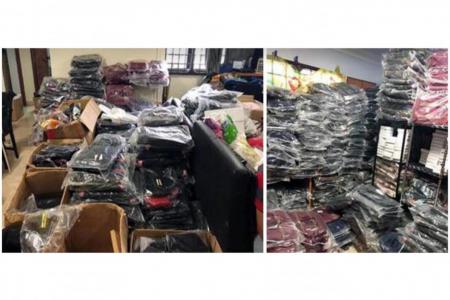 Man arrested after $520k of fake goods seized