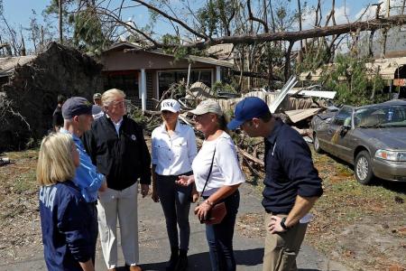 Trump questions climate change during hurricane damage tour