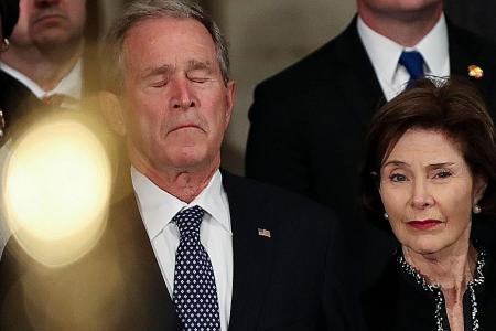 Trump, Washington elite honour the late former president Bush