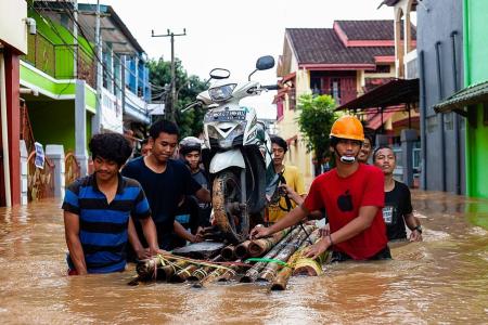 Indonesia flood, landslide death toll rises