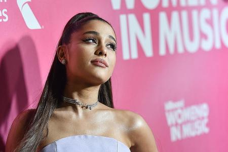 Ariana Grande first act since Beatles to claim top three on US chart