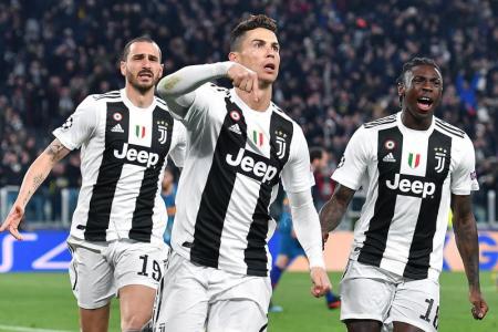 Ronaldo nets hat-trick to send Juventus into q-finals
