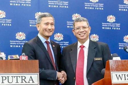 S&#039;pore, M&#039;sia agree to jointly suspend overlapping port claims