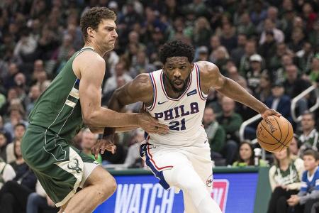 Sixers beat Bucks to clinch play-off spot