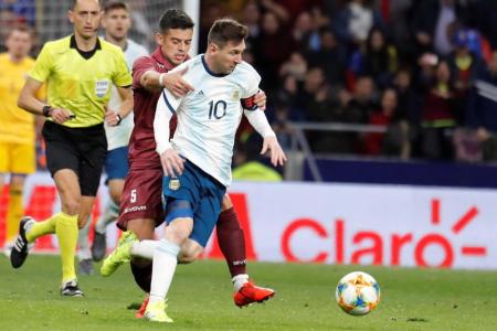 Messi injured on return to international duty