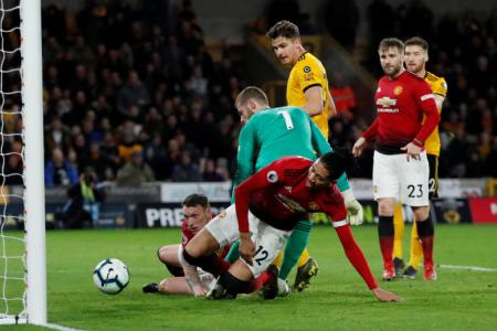 Hungry Wolves devour 10-man Manchester United