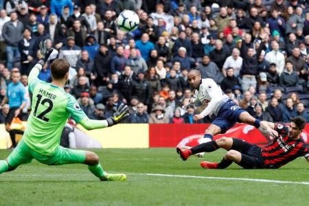 Moura bags hat-trick as Spurs sink Huddersfield 4-0