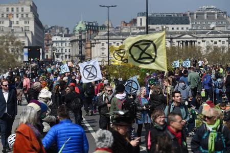 Thousands of environmental activists paralyse parts of London