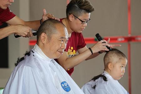 455 supporters make bald statement for cancer