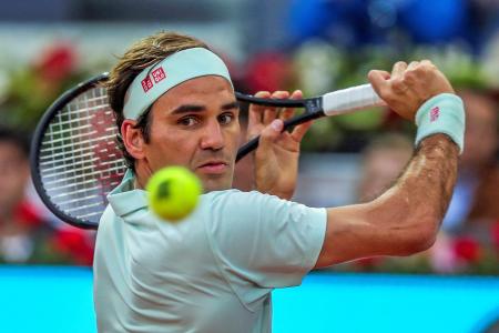 Roger Federer glad to be back on clay