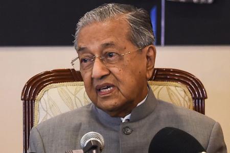 Mahathir: Inherited problems have to be fixed before I can step down