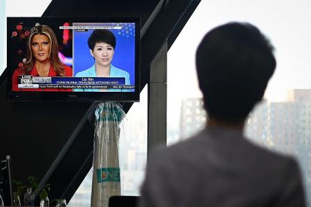 Fox host, Chinese state TV anchor face off over trade war