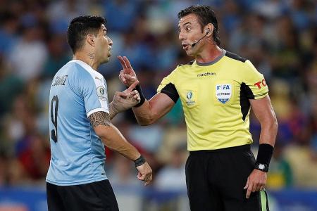 Luis Suarez’s referee remonstrations steal the show against Chile