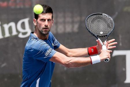 No grass courts, no problem for Novak Djokovic