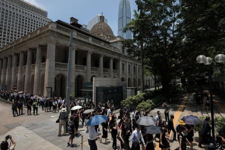 Hundreds of HK lawyers march to support anti-govt protesters 