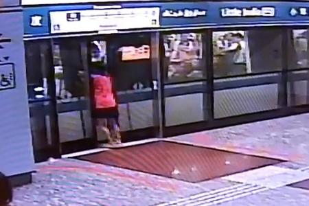 Woman gets stuck between MRT train and platform doors 