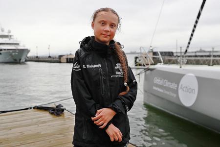 Swedish teen climate activist reaches New York by boat for UN summit 
