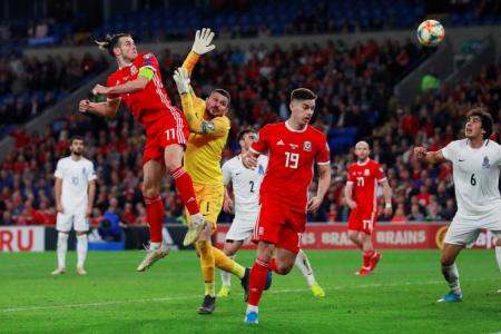 Bale rescues Wales with late goal
