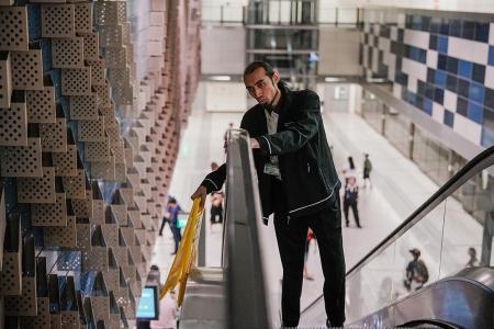 SBS Transit staff member rescues boy hanging off moving escalator