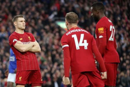 Salah injury overshadows late win for Liverpool