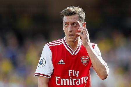 Arsenal midfielder Mesut Oezil: Stop pointing the finger at me