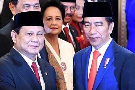 Jokowi takes big gamble by including fierce rival in Cabinet