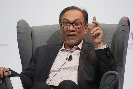 Anwar, Mahathir meet to discuss transition