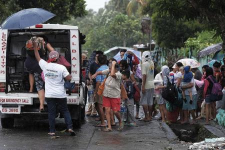 Thousands flee as typhoon heads towards Philippines