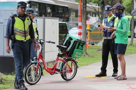 GrabFood to still use e-scooters, will ban those caught on footpaths